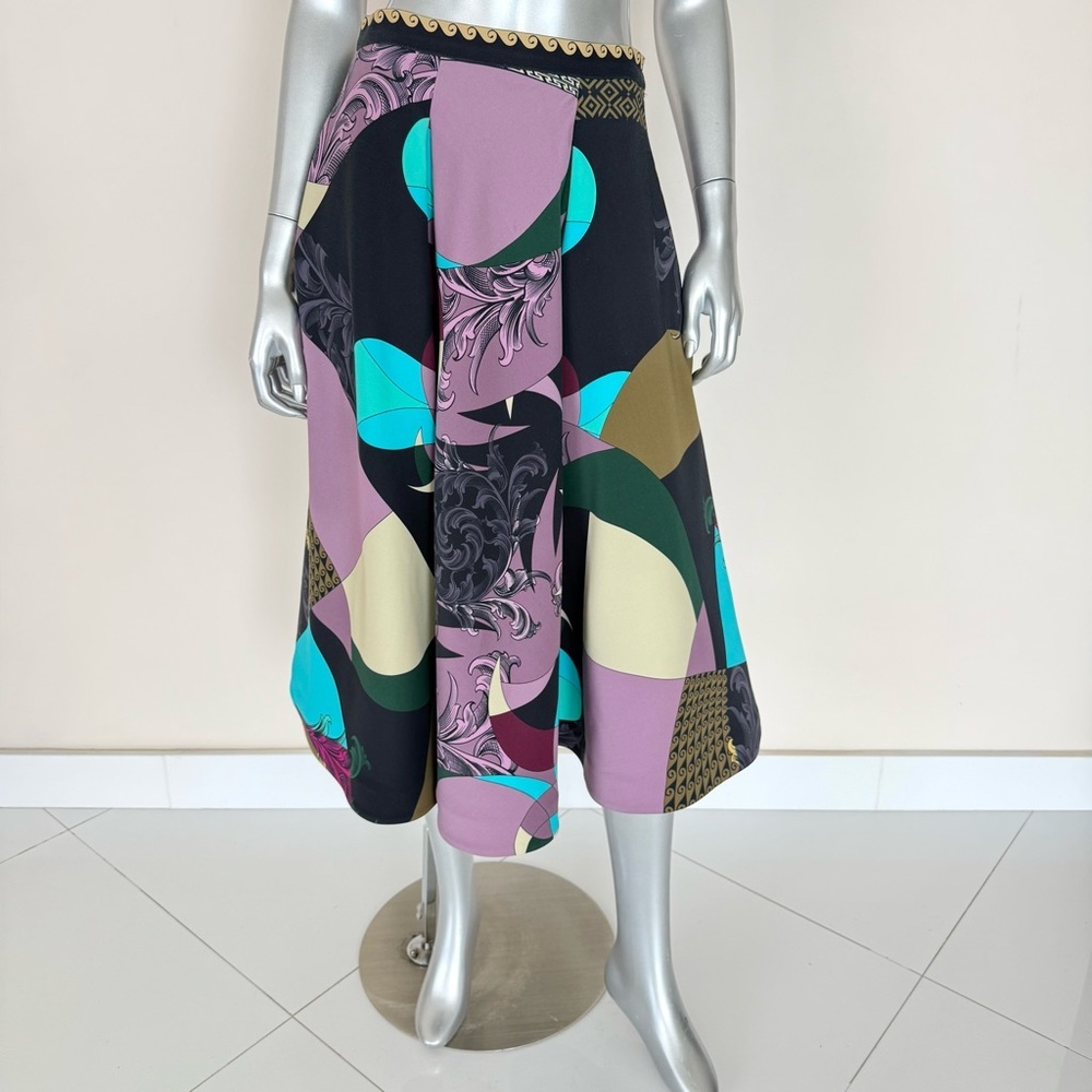Designer women mid length women skirt size 6 US